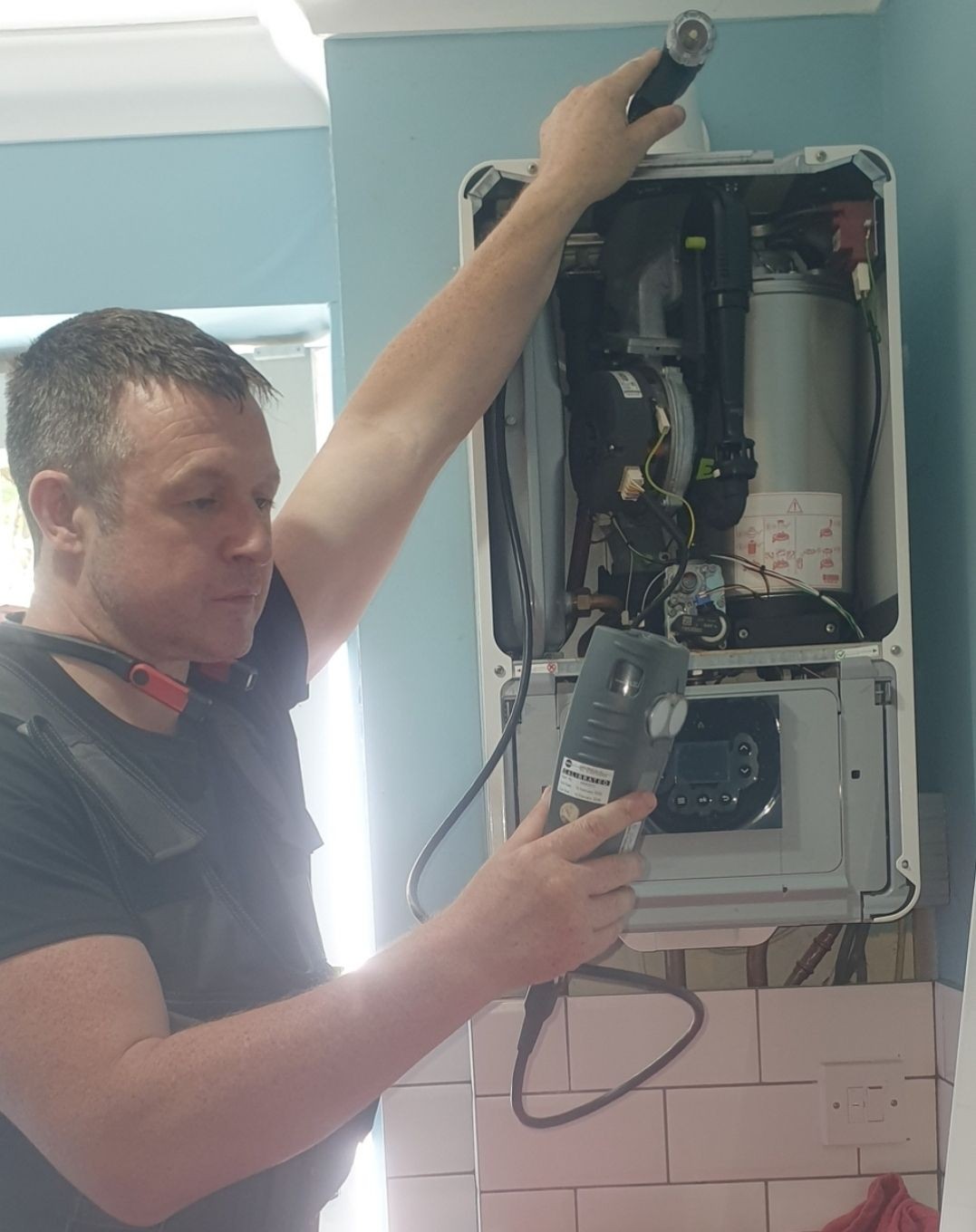 Gas Safe engineer servicing a wall-mounted boiler during a routine appointment in Frant – Absolute Plumbing & Heating. Gas Safe engineer servicing a wall-mounted boiler during a routine appointment in Frant – Absolute Plumbing & Heating.