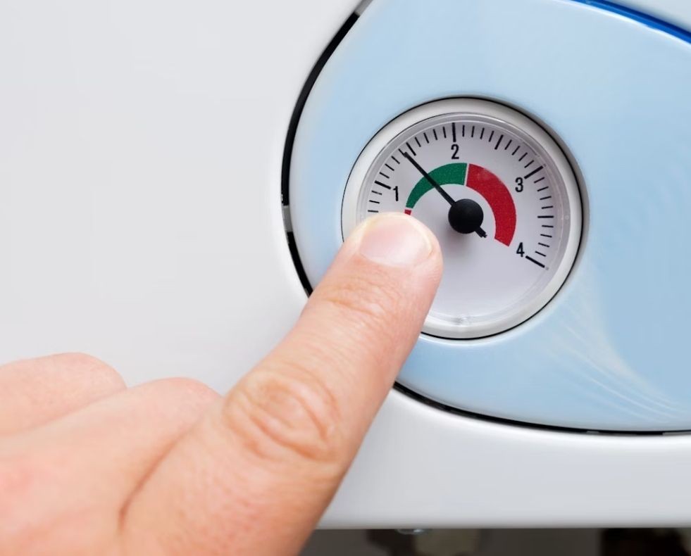 Checking boiler pressure on a modern heating system in a Tunbridge Wells home Checking boiler pressure on a modern heating system in a Tunbridge Wells home