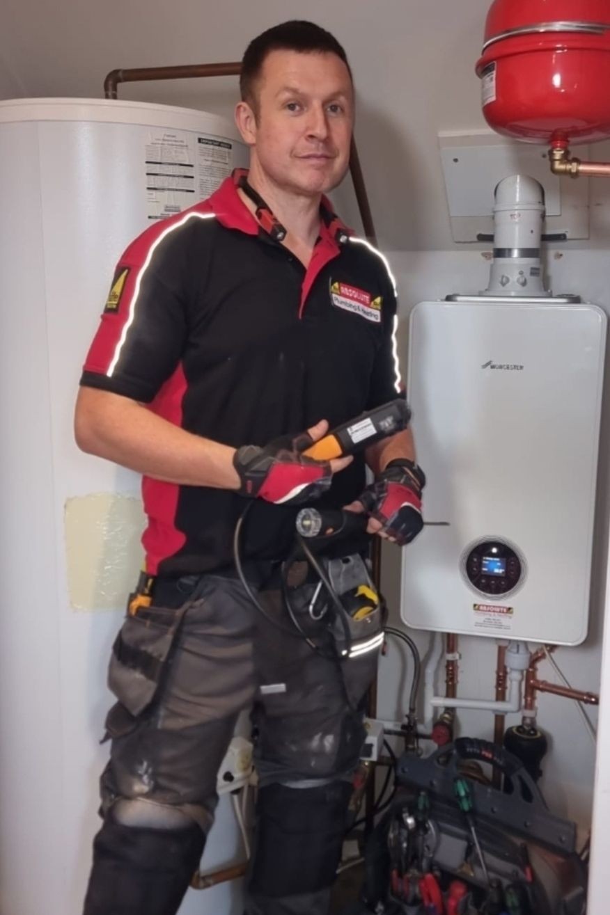 "Gas Safe registered Worcester Bosch accredited installer Daniel Angel from Absolute Plumbing & Heating fitting a new Worcester boiler in Crowborough." "Gas Safe registered Worcester Bosch accredited installer Daniel Angel from Absolute Plumbing & Heating fitting a new Worcester boiler in Crowborough."